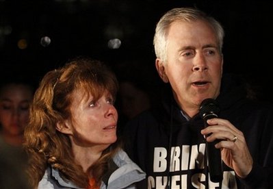 Brent King, right, and Kelly King, left, parents of missing teenager Chelsea King, speak at a candlelight vigil held at St. Michael's 