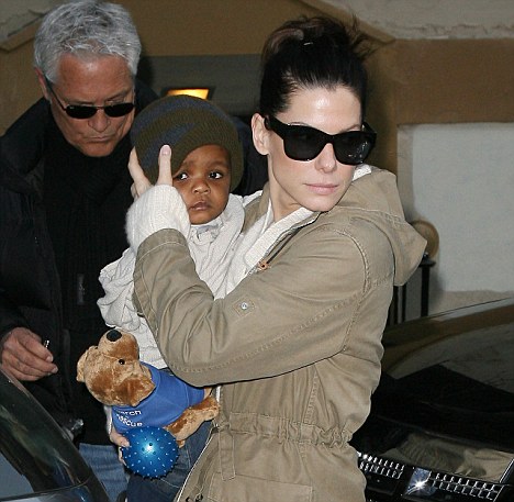 Divorced actress Sandra Bullock with her adopted son, Louis